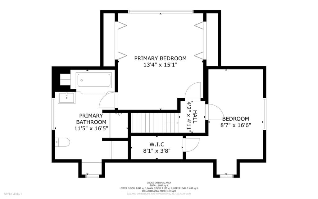 Black and white floor plan of an upper level featuring a primary bedroom, a primary bathroom with a bathtub, a second bedroom, a walk-in closet, and a hallway. Room dimensions are labeled, and staircase access is shown in the center.