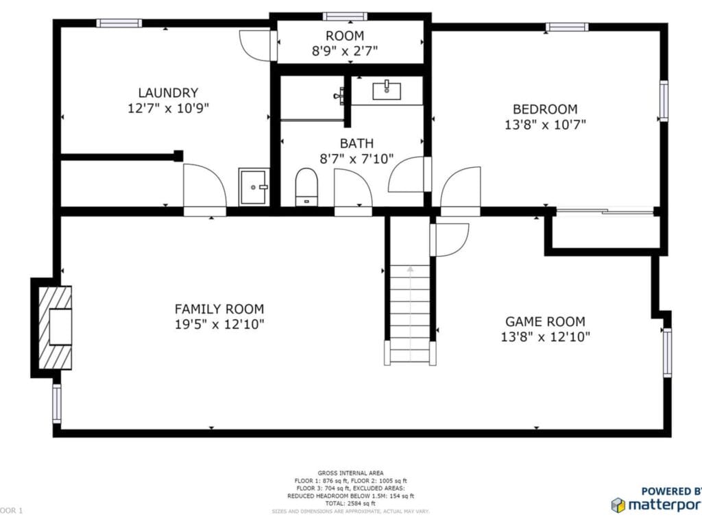 Floor plan layout showing a family room, game room, bedroom, bath, laundry area, and another room. Dimensions are labeled on each room, and stair access is depicted centrally. Powered by Matterport logo in the corner.