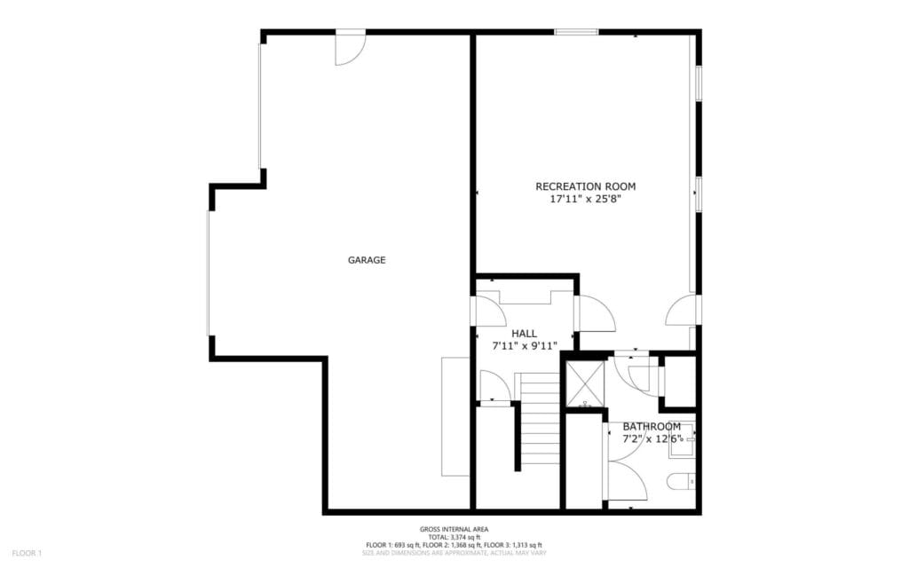 Black and white floor plan showing a garage, a large recreation room, a hall, and a bathroom. The garage is on the left; the recreation room, hall, and bathroom are on the right. Stairs are next to the hall.